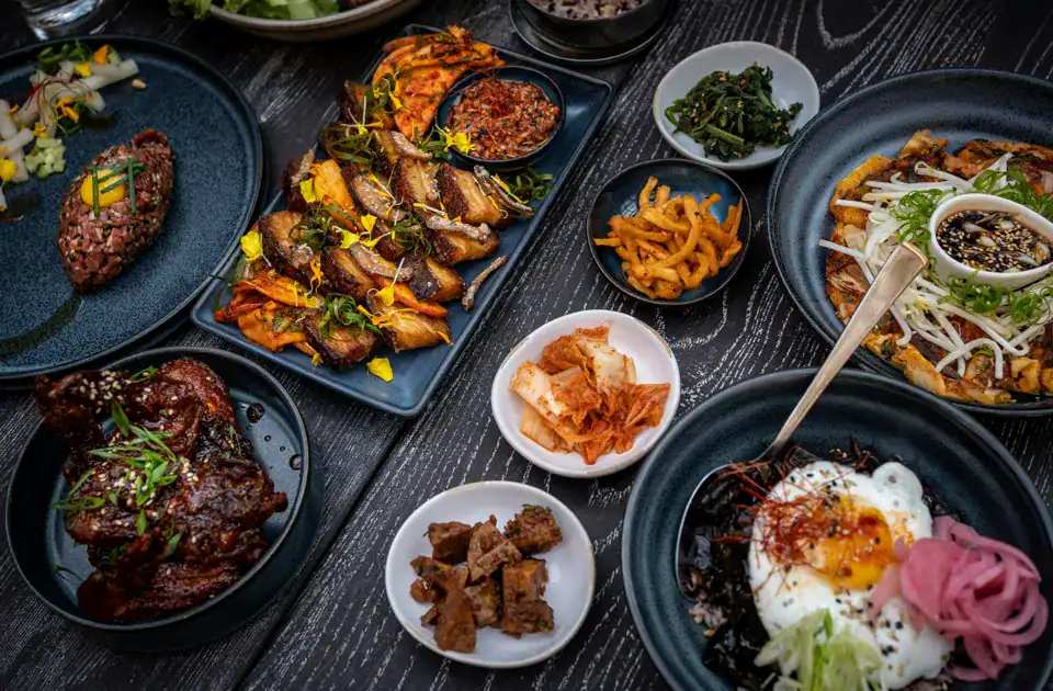 OLCHI Korean Cuisine table spread with banchan and Korean dishes