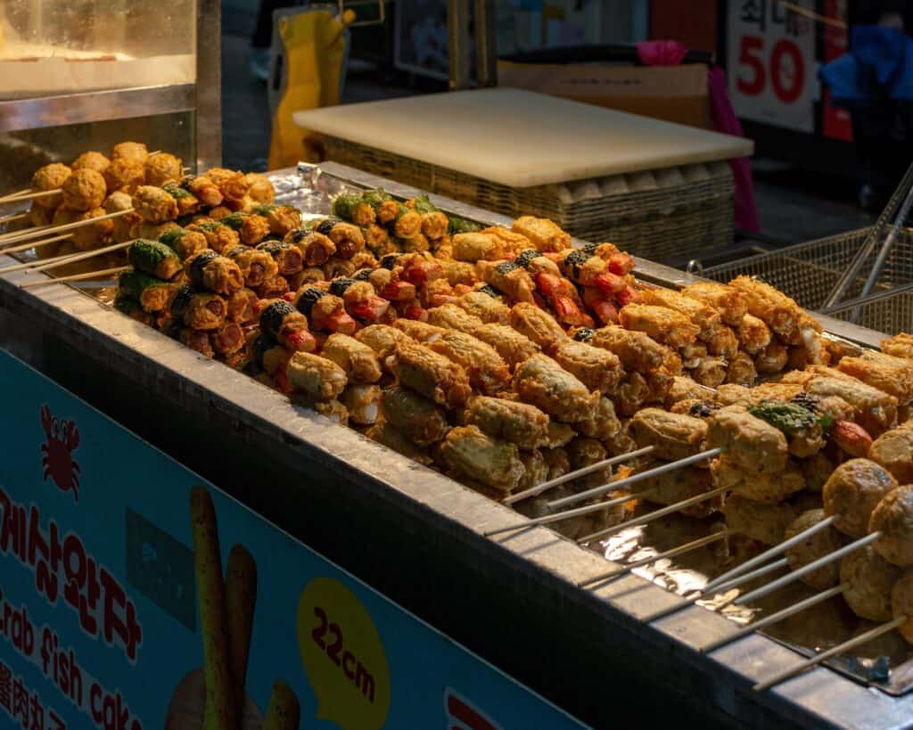 myeongdong night market food guide 2026 korean street food skewers and fish cake stall